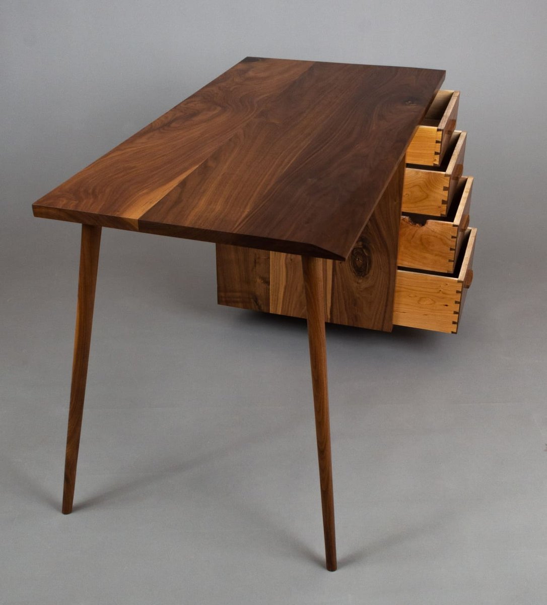 Mid-century style walnut desk with drawers and tapered legs in Central Connecticut by Riverbend Renovations